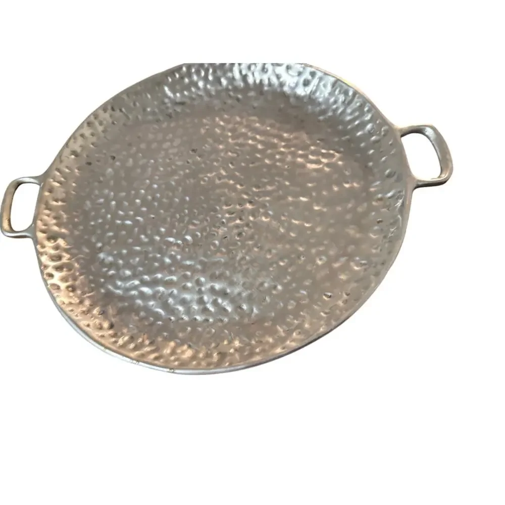 Hammered Aluminum Serving Tray from Mexico .Twelve inches diameter.